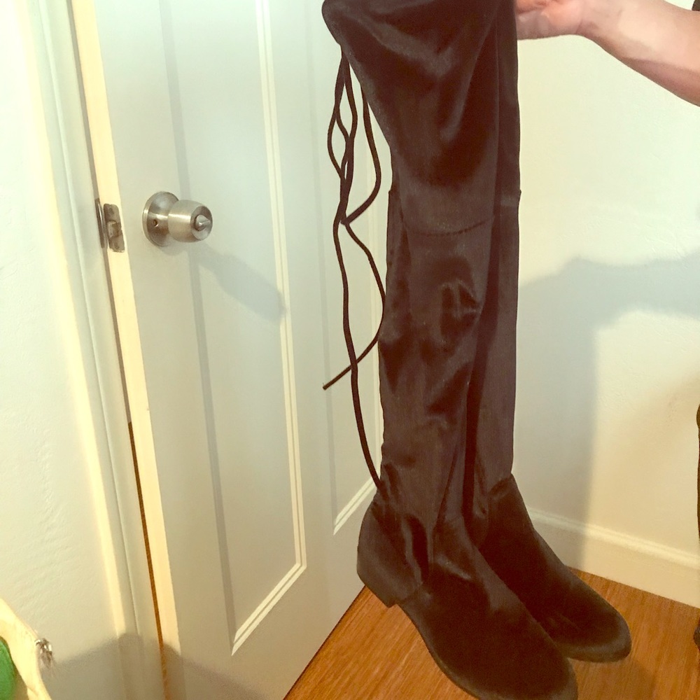 Thigh high flat boots